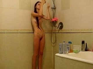 Phthisic girl under burnish apply shower